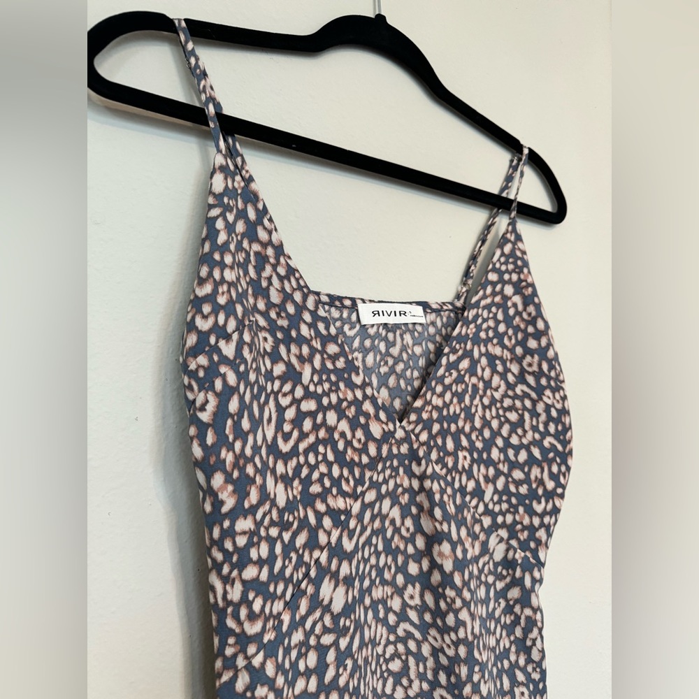 Brand new Maxi dress with a v-neck top and slit